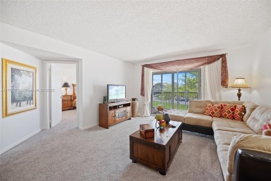 BRIGHT AND SPACIOUS CONDO, AVAILABLE IN THE SOUGHT-AFTER on Flamingo Lakes Country Club in Florida - for sale on GolfHomes.com, golf home, golf lot
