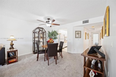BRIGHT AND SPACIOUS CONDO, AVAILABLE IN THE SOUGHT-AFTER on Flamingo Lakes Country Club in Florida - for sale on GolfHomes.com, golf home, golf lot