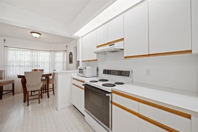 BRIGHT AND SPACIOUS CONDO, AVAILABLE IN THE SOUGHT-AFTER on Flamingo Lakes Country Club in Florida - for sale on GolfHomes.com, golf home, golf lot