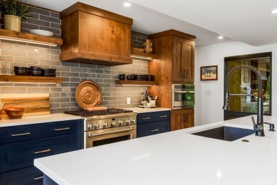 Lake Lifestyle! + Luxurious Remodel + Unbeatable Location ! on Lake Quivira Country Club in Kansas - for sale on GolfHomes.com, golf home, golf lot