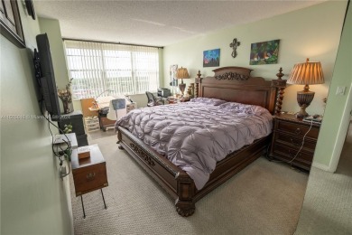 Welcome to this immaculate 2-bedroom, 2-bathroom condo on the on Pembroke Lakes Golf Club in Florida - for sale on GolfHomes.com, golf home, golf lot