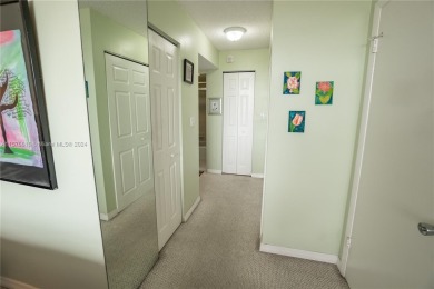 Welcome to this immaculate 2-bedroom, 2-bathroom condo on the on Pembroke Lakes Golf Club in Florida - for sale on GolfHomes.com, golf home, golf lot