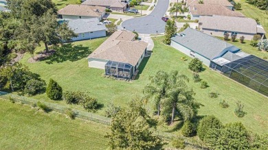 Welcome to your ideal Florida retirement retreat! This move-in on The Groves Golf and Country Club in Florida - for sale on GolfHomes.com, golf home, golf lot