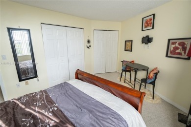 Welcome to this immaculate 2-bedroom, 2-bathroom condo on the on Pembroke Lakes Golf Club in Florida - for sale on GolfHomes.com, golf home, golf lot