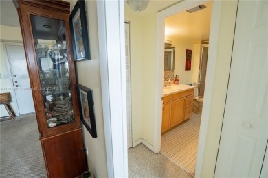 Welcome to this immaculate 2-bedroom, 2-bathroom condo on the on Pembroke Lakes Golf Club in Florida - for sale on GolfHomes.com, golf home, golf lot