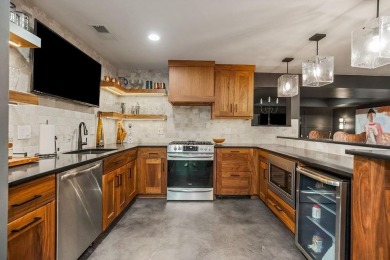 Lake Lifestyle! + Luxurious Remodel + Unbeatable Location ! on Lake Quivira Country Club in Kansas - for sale on GolfHomes.com, golf home, golf lot
