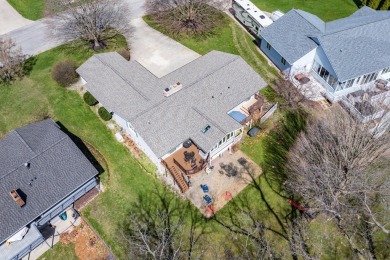 This fantastic home overlooks the 14th green of Lake Cora Hills on Lake Cora Hills Golf Club in Michigan - for sale on GolfHomes.com, golf home, golf lot