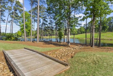 Step into the lap of luxury with this breathtaking 4-bedroom, 4 on Reynolds Lake Oconee - The Oconee in Georgia - for sale on GolfHomes.com, golf home, golf lot