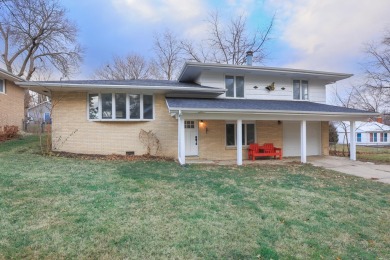 Welcome to 2427 E 30th Street - a stunningly renovated on Grand View Golf Course in Iowa - for sale on GolfHomes.com, golf home, golf lot