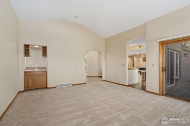 Take a look at this gorgeous Ranch style home on a 1/2 acre lot on Ptarmigan Golf Course in Colorado - for sale on GolfHomes.com, golf home, golf lot