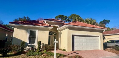 Gated community, nested on the 7th fairway of the Marsh golf on Bluewater Bay Resort in Florida - for sale on GolfHomes.com, golf home, golf lot