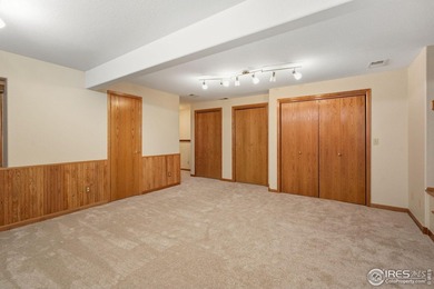 Take a look at this gorgeous Ranch style home on a 1/2 acre lot on Ptarmigan Golf Course in Colorado - for sale on GolfHomes.com, golf home, golf lot