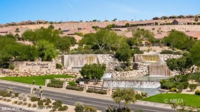 Set against the scenic backdrop of a manicured golf course, this on Conestoga Golf Club in Nevada - for sale on GolfHomes.com, golf home, golf lot