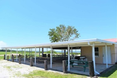 Half acre lot located in tranquil community of Indian Lake on Indian Lake Estates Golf and Country Club in Florida - for sale on GolfHomes.com, golf home, golf lot