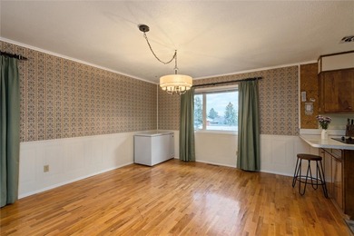 This one level home sits just off the 1st green of Lake Hills on Lake Hills Golf Course in Montana - for sale on GolfHomes.com, golf home, golf lot