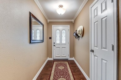 This charming three-bedroom brick home features a two-car garage on Lost Creek Golf Course in Texas - for sale on GolfHomes.com, golf home, golf lot