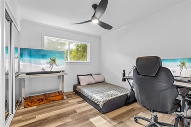 Beautifully redesigned for modern island living and effortless on Waikoloa Village Golf Club in Hawaii - for sale on GolfHomes.com, golf home, golf lot