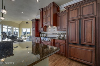 Custom built home with brick & stone exterior in premier on Tanasi Golf Course in Tennessee - for sale on GolfHomes.com, golf home, golf lot