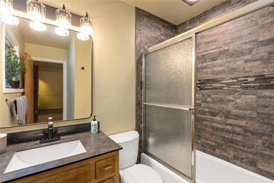 This one level home sits just off the 1st green of Lake Hills on Lake Hills Golf Course in Montana - for sale on GolfHomes.com, golf home, golf lot