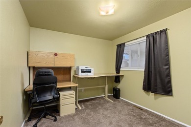 This one level home sits just off the 1st green of Lake Hills on Lake Hills Golf Course in Montana - for sale on GolfHomes.com, golf home, golf lot