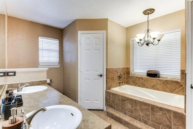 This charming three-bedroom brick home features a two-car garage on Lost Creek Golf Course in Texas - for sale on GolfHomes.com, golf home, golf lot