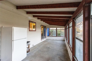 This one level home sits just off the 1st green of Lake Hills on Lake Hills Golf Course in Montana - for sale on GolfHomes.com, golf home, golf lot