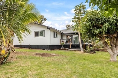 Beautifully redesigned for modern island living and effortless on Waikoloa Village Golf Club in Hawaii - for sale on GolfHomes.com, golf home, golf lot
