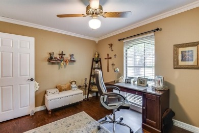 This charming three-bedroom brick home features a two-car garage on Lost Creek Golf Course in Texas - for sale on GolfHomes.com, golf home, golf lot