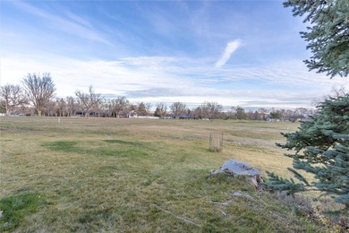 This one level home sits just off the 1st green of Lake Hills on Lake Hills Golf Course in Montana - for sale on GolfHomes.com, golf home, golf lot