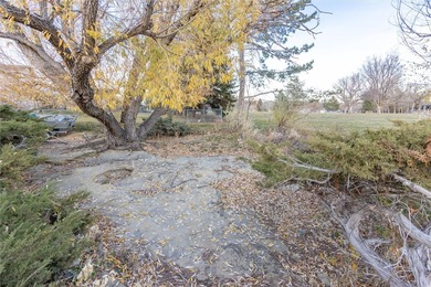 This one level home sits just off the 1st green of Lake Hills on Lake Hills Golf Course in Montana - for sale on GolfHomes.com, golf home, golf lot