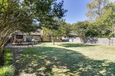 This charming three-bedroom brick home features a two-car garage on Lost Creek Golf Course in Texas - for sale on GolfHomes.com, golf home, golf lot