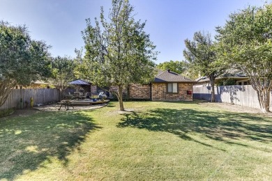 This charming three-bedroom brick home features a two-car garage on Lost Creek Golf Course in Texas - for sale on GolfHomes.com, golf home, golf lot
