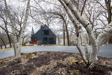 Welcome to Feather Trail, a four-bedroom, three-bathroom luxury on Apple Canyon Lake Golf Course in Illinois - for sale on GolfHomes.com, golf home, golf lot