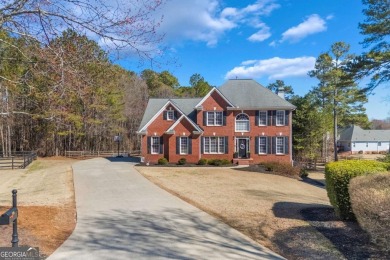 Welcome to this stunning brick home situated on a large 1 ACRE on The Providence Club in Georgia - for sale on GolfHomes.com, golf home, golf lot