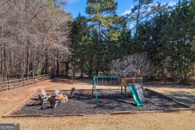 Welcome to this stunning brick home situated on a large 1 ACRE on The Providence Club in Georgia - for sale on GolfHomes.com, golf home, golf lot