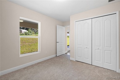 Crafted by an award-winning builder, this Citrus Springs home on Citrus Springs Country Club in Florida - for sale on GolfHomes.com, golf home, golf lot