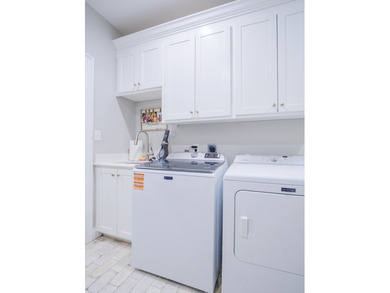 Welcome to your dream home in Kinderlou, where resort-style on Kinderlou Forest Golf Club in Georgia - for sale on GolfHomes.com, golf home, golf lot