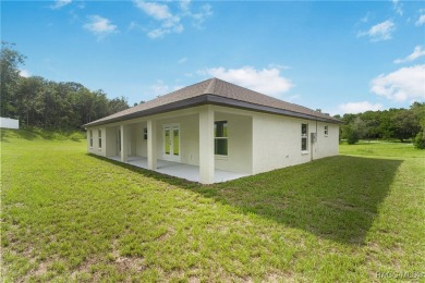 Crafted by an award-winning builder, this Citrus Springs home on Citrus Springs Country Club in Florida - for sale on GolfHomes.com, golf home, golf lot