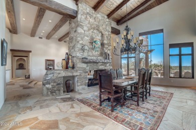 This high-quality custom home with sunset views in guard-gated on Mirabel Golf Club in Arizona - for sale on GolfHomes.com, golf home, golf lot