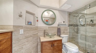 Move-in ready! Updated maintenance-free villa with serene pond on The Meadows Golf and Country Club in Florida - for sale on GolfHomes.com, golf home, golf lot