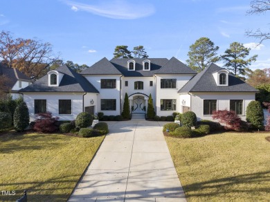 Backing to the 18th fairway of The Oaks course on a highly on North Ridge Country Club in North Carolina - for sale on GolfHomes.com, golf home, golf lot