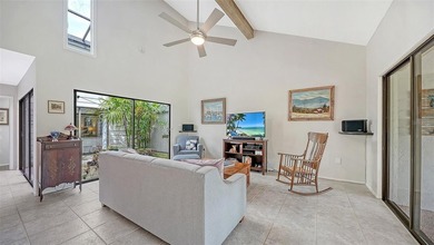 Move-in ready! Updated maintenance-free villa with serene pond on The Meadows Golf and Country Club in Florida - for sale on GolfHomes.com, golf home, golf lot