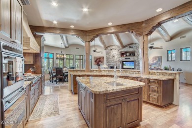 This high-quality custom home with sunset views in guard-gated on Mirabel Golf Club in Arizona - for sale on GolfHomes.com, golf home, golf lot