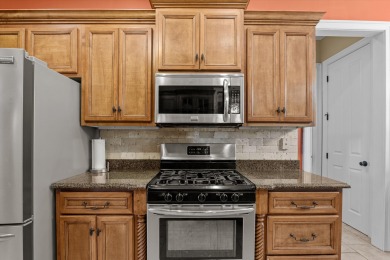 Welcome to this stunning 5-bedroom, 3-bathroom custom-built home on Bartram Trail Golf Club in Georgia - for sale on GolfHomes.com, golf home, golf lot