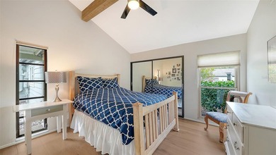 Move-in ready! Updated maintenance-free villa with serene pond on The Meadows Golf and Country Club in Florida - for sale on GolfHomes.com, golf home, golf lot