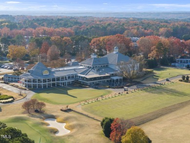 Backing to the 18th fairway of The Oaks course on a highly on North Ridge Country Club in North Carolina - for sale on GolfHomes.com, golf home, golf lot