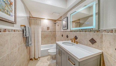 Move-in ready! Updated maintenance-free villa with serene pond on The Meadows Golf and Country Club in Florida - for sale on GolfHomes.com, golf home, golf lot