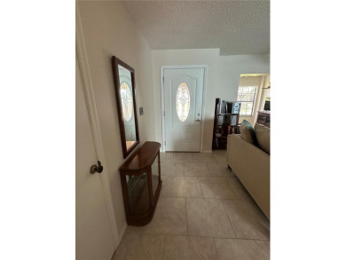 Welcome Home!  This charming 2 BR, 2 BA, 1 car garage is move-in on River Ridge Golf Club in Florida - for sale on GolfHomes.com, golf home, golf lot