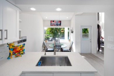 Welcome to this exceptional one-story estate in the highly on Boca West Golf and Country Club in Florida - for sale on GolfHomes.com, golf home, golf lot
