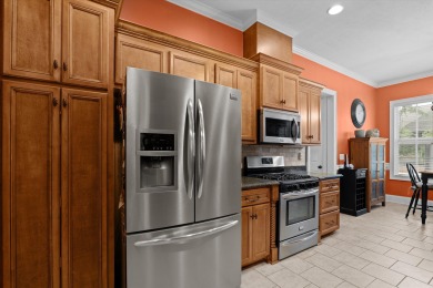 Welcome to this stunning 5-bedroom, 3-bathroom custom-built home on Bartram Trail Golf Club in Georgia - for sale on GolfHomes.com, golf home, golf lot